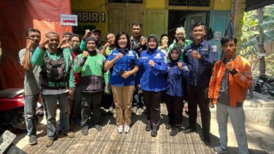 Polres Mojokerto Rayakan HUT Humas Polri ke-73 Bersama Puluhan Driver Ojol dengan Makan Tumpeng